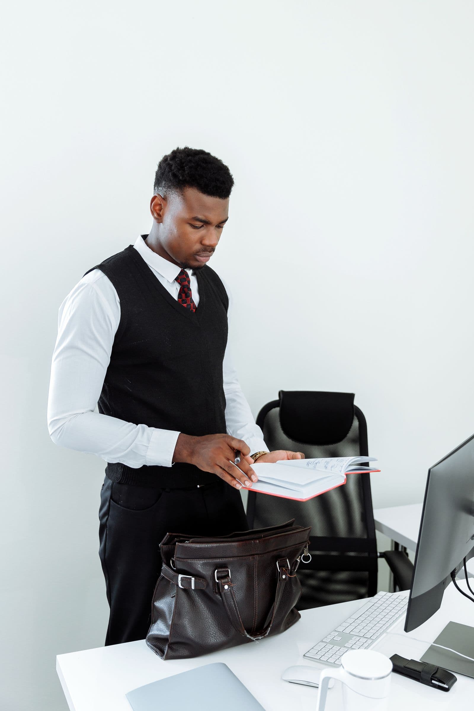 A JM Tax and Accounting professional reviewing client documents